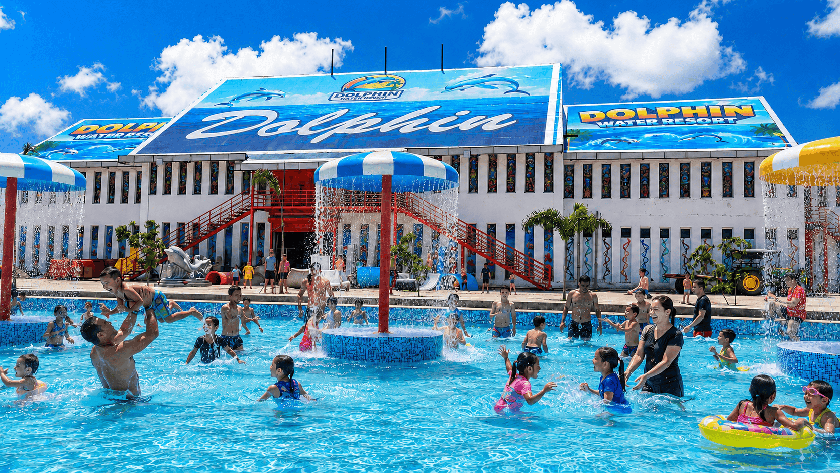 Guests in the pool in front of the Dolphin Water Resort building